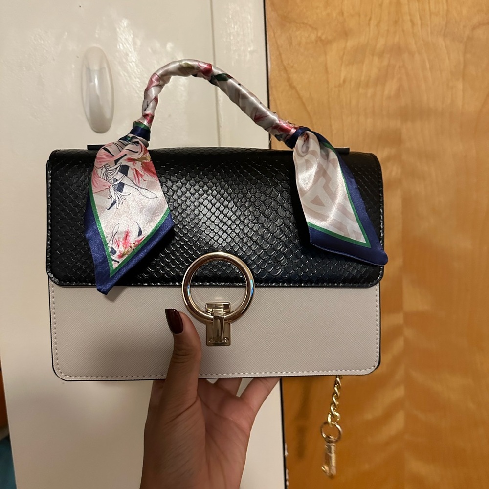 Gorgeous multi color purse with gold chain and scarf detail